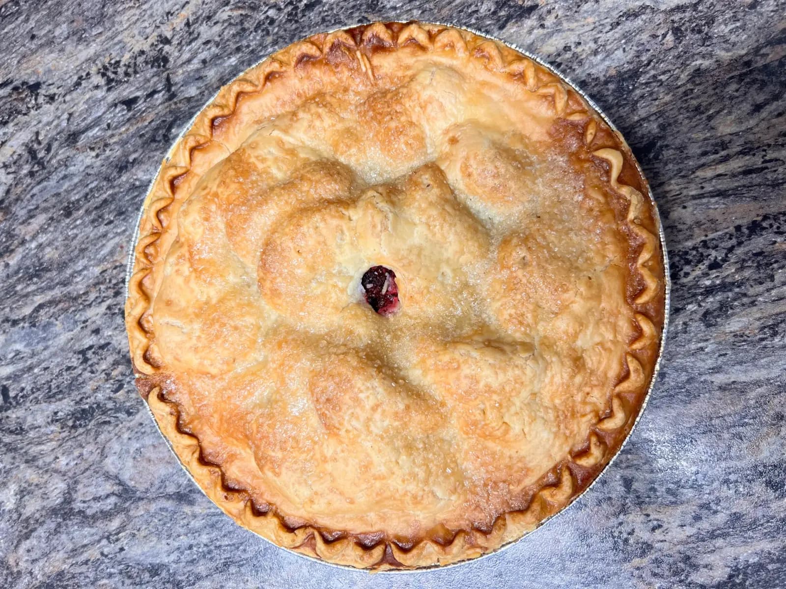 Homemade fruit pie with top and bottom crust from the Lewis Farms bakery