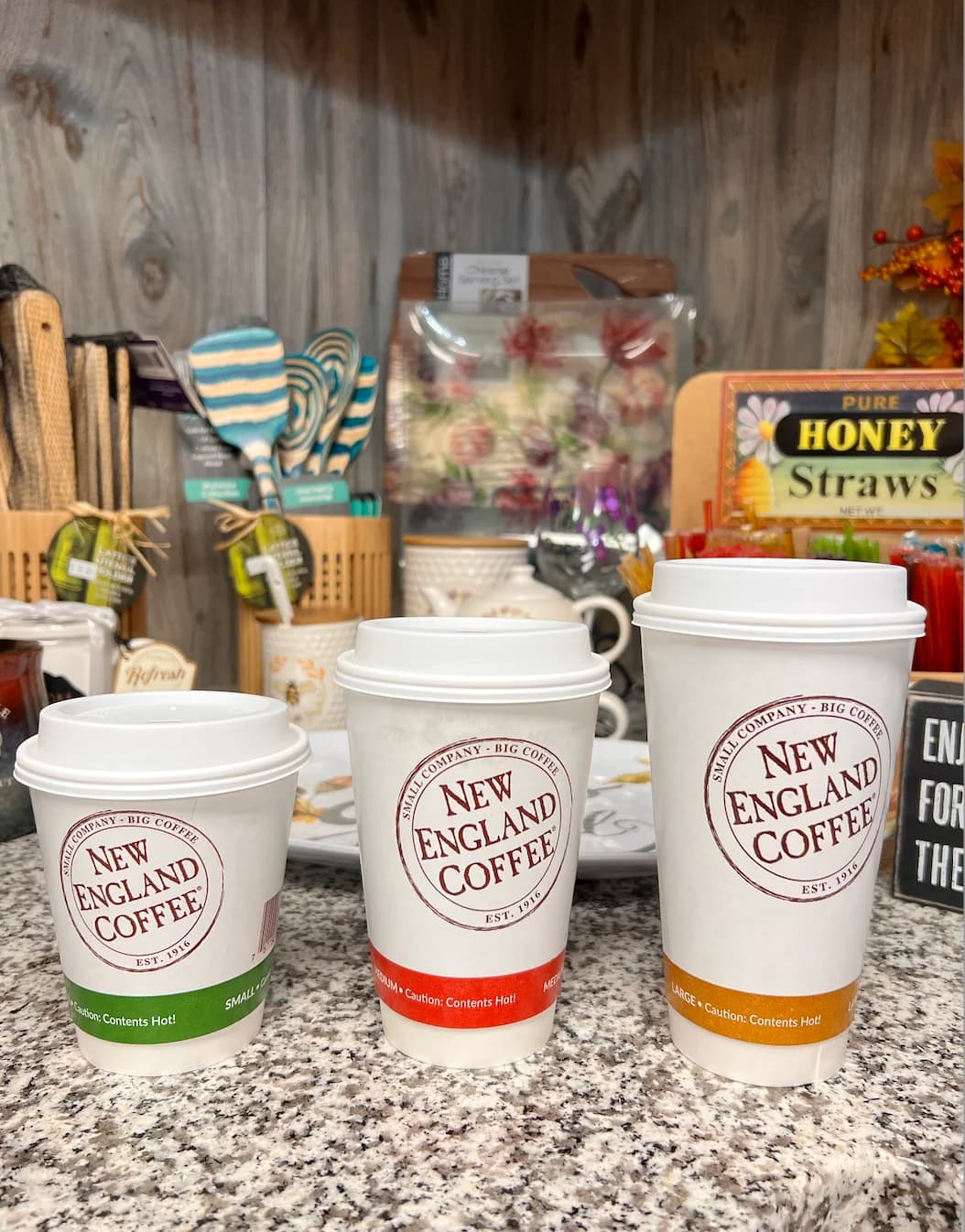 Small, medium, and large coffee cups at the Lewis Farms self-serve counter